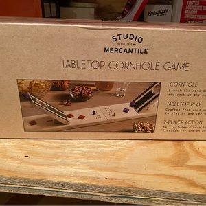 New in box table top corn hole game. Never out of box